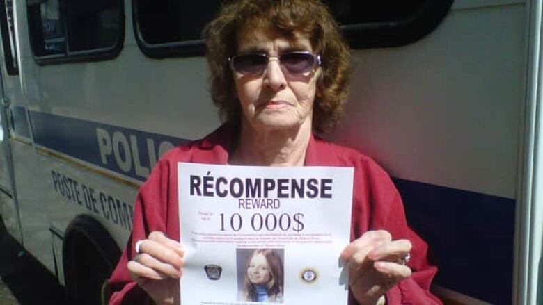 Yvonne Prior held a missing poster of her daughter Sharron in 2012, found dead 37 years prior in Longueuil.