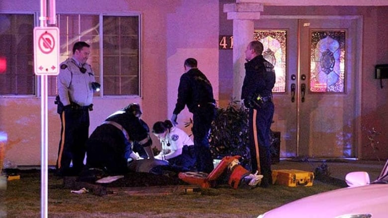 First responders attend to the victim of a road rage incident