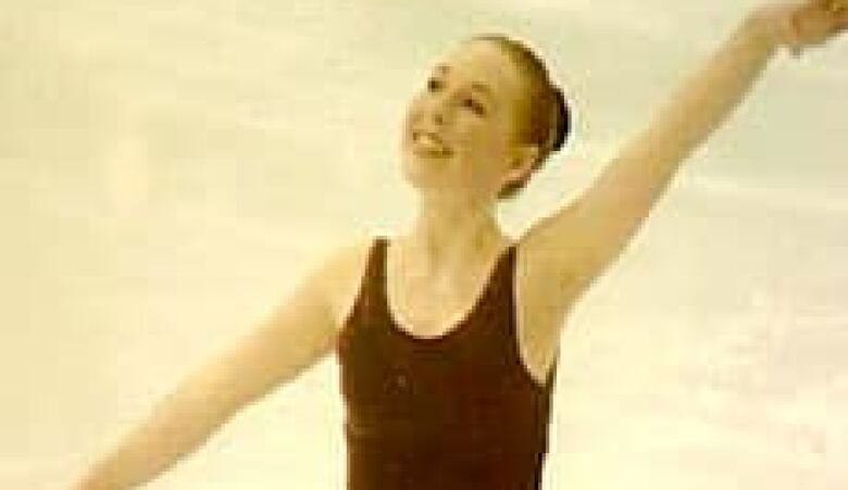 Stephanie Donnelly is pictured on ice in a figure skateing pose.