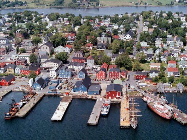 An overhead shot of the Lunenburg waterfront and it colourful homes and boats