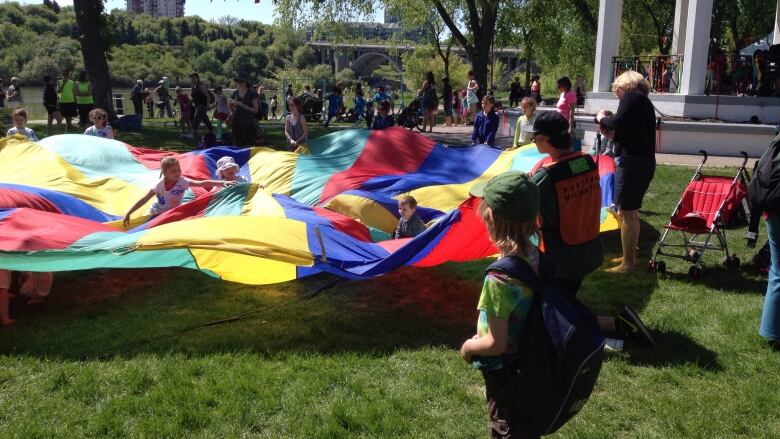 Kids playing at a festival. 