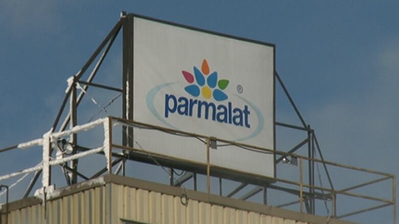 A Parmalat sign on a building.