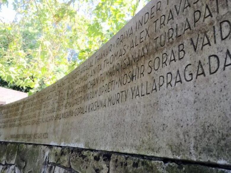 A stone slab with carved names in Vancouver's Stanley Park commemorating the victims of the Air India bombing in 1985.