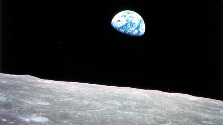 An image shows Earth as seen from the moon.