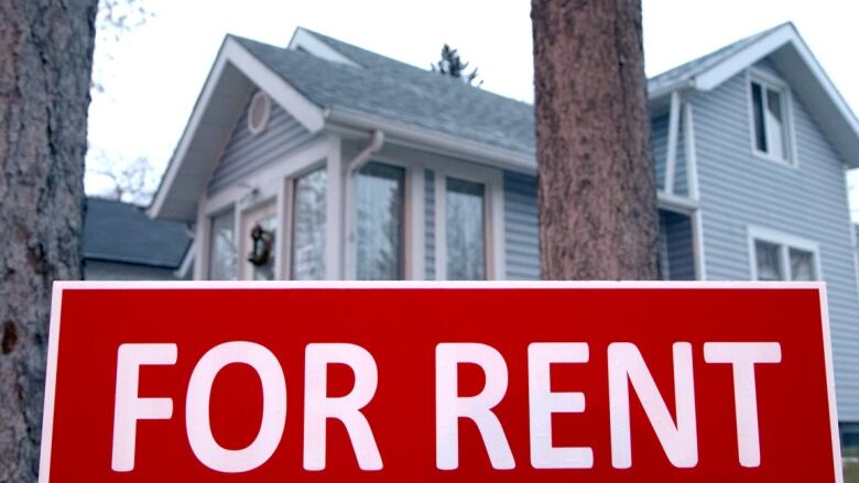 A sign advertises available rental accommodations at a house in Calgary.