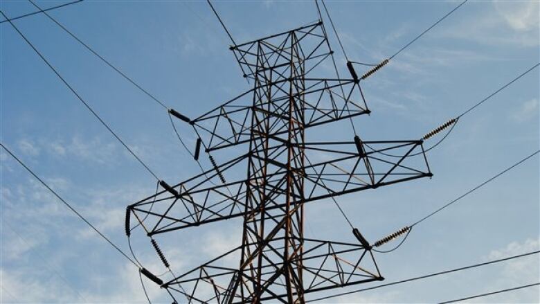 Hydro tower against blue sky