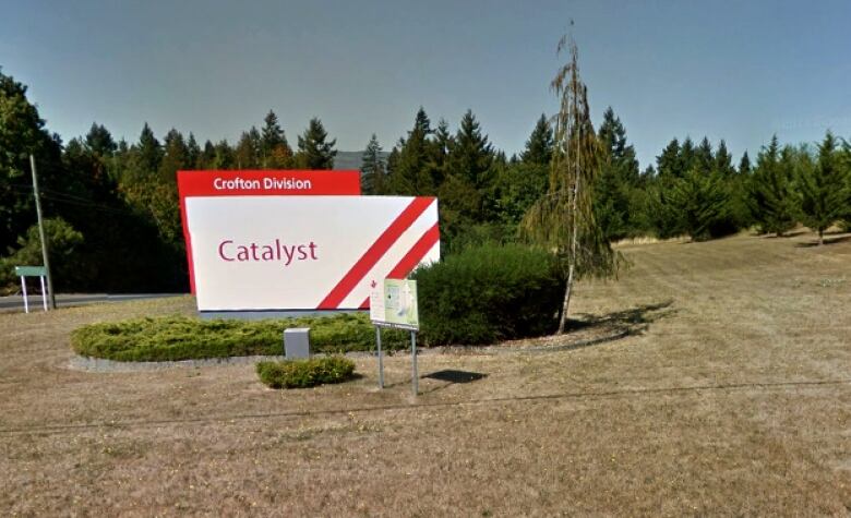 A sign reads 'Crofton Division Catalyst' on a grassy field.