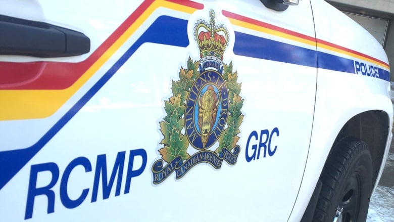 An RCMP logo on the side of a vehicle.