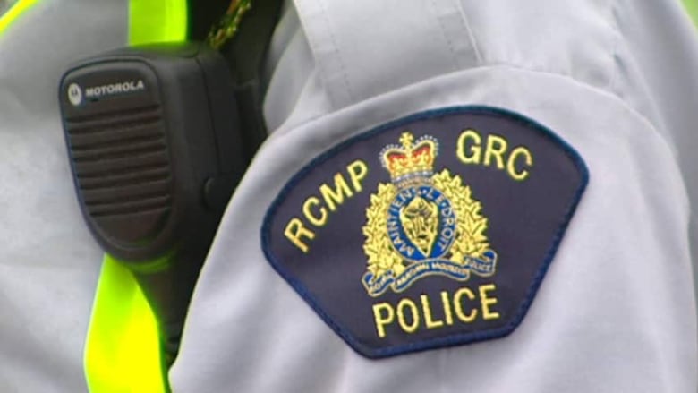 A close-up picture of an RCMP badge.