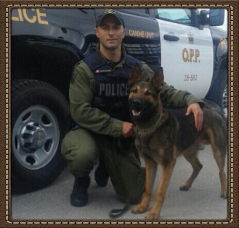 Essex County OPP Constable Milan Matovski with two-year-old K9 Maximus.