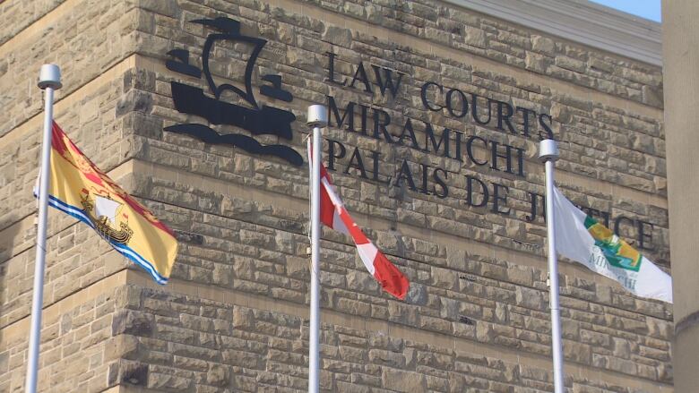 flags flying outside courthouse