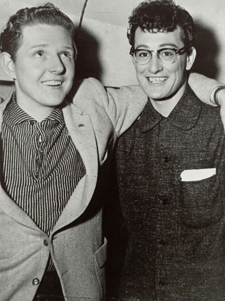 A picture of Buddy Holly and Red Robinson together.