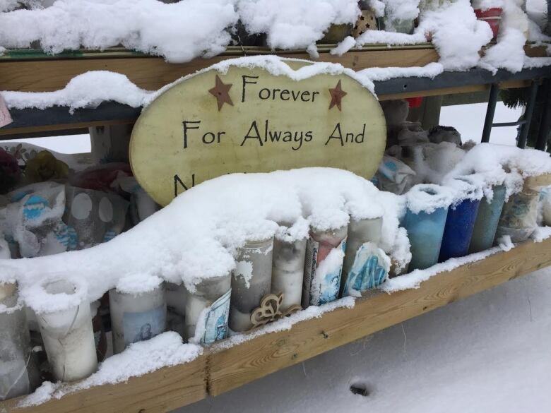 Memorial covered in snow for those who were killed in the 2016 La Loche shooting.