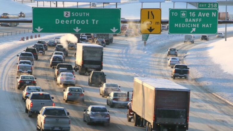 Dozens of cars sit in traffic along Deerfoot Trail in the winter.