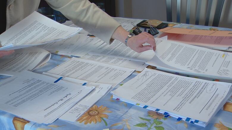 Papers on a desk.