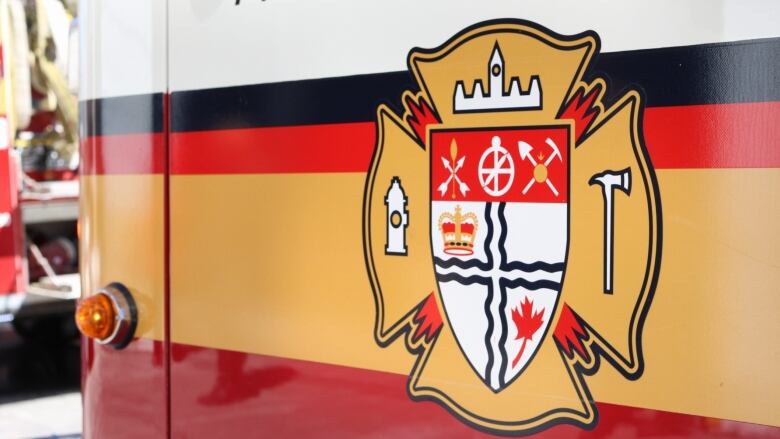 A close-up Ottawa Fire Services logo on a firetruck. 