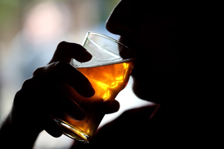 A man drinking beer