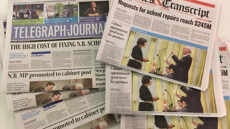 The front pages of newspapers printed in New Brunswick.