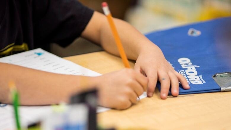 A student works at an Oxford Learning program in Toronto on Thursday, Dec. 7, 2017