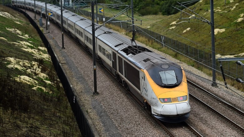 A Eurostar train travels through the countryside near Maidstone in Kent, south east England, on August 25, 2015.