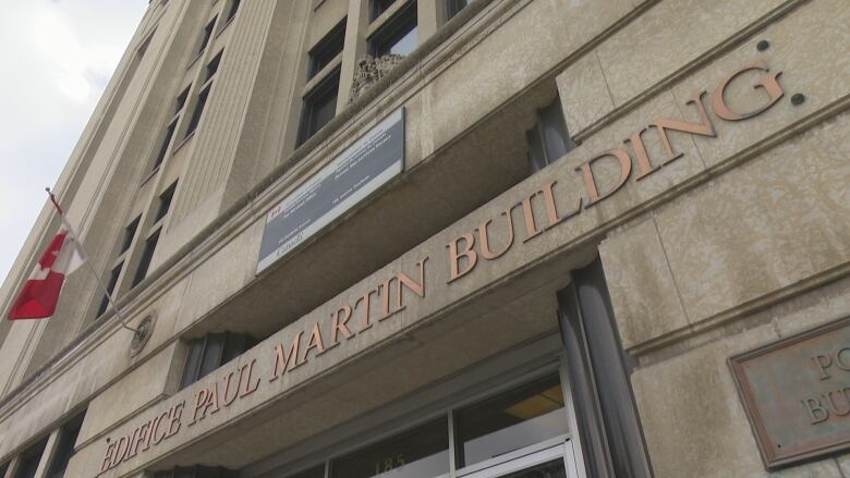 A sign saying Paul Martin Building