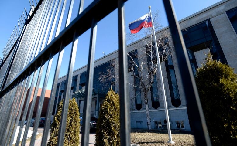 The flag flies outside the Embassy of the Russian Federation to Canada in Ottawa on Monday, March 26, 2018.