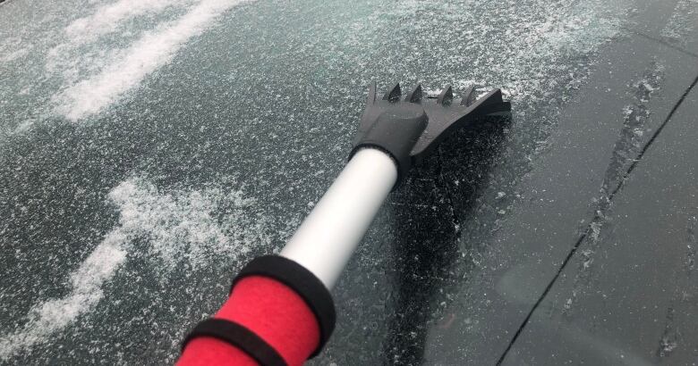 A layer of ice coats a vehicle in the east end of Toronto on sunday morning,  End of Toronto, near Donlands and Danforth avenues. 