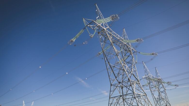 Three large transmission towers.