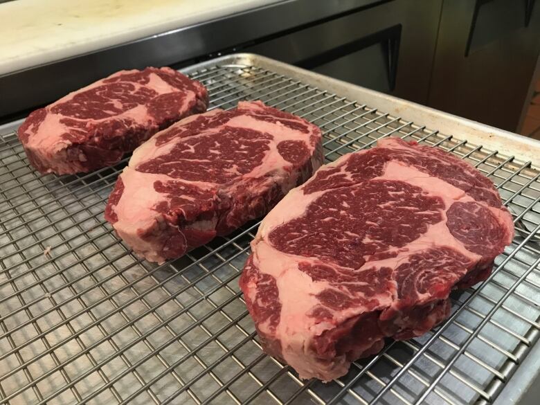 Three slabs of steaks