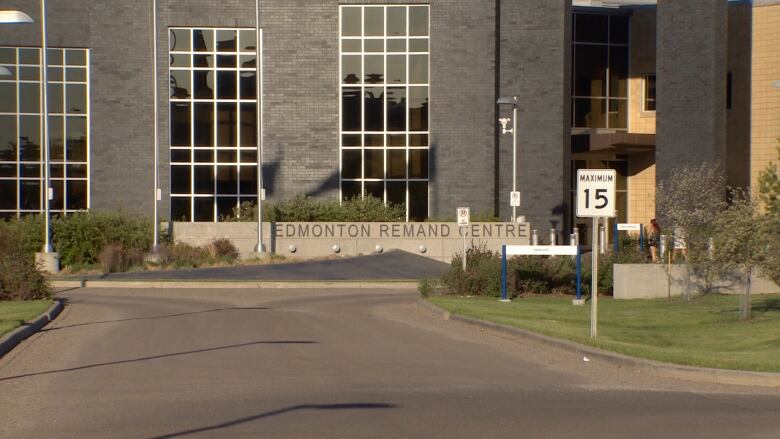 The exterior of the Edmonton Remand Centre is seen on a sunny day.