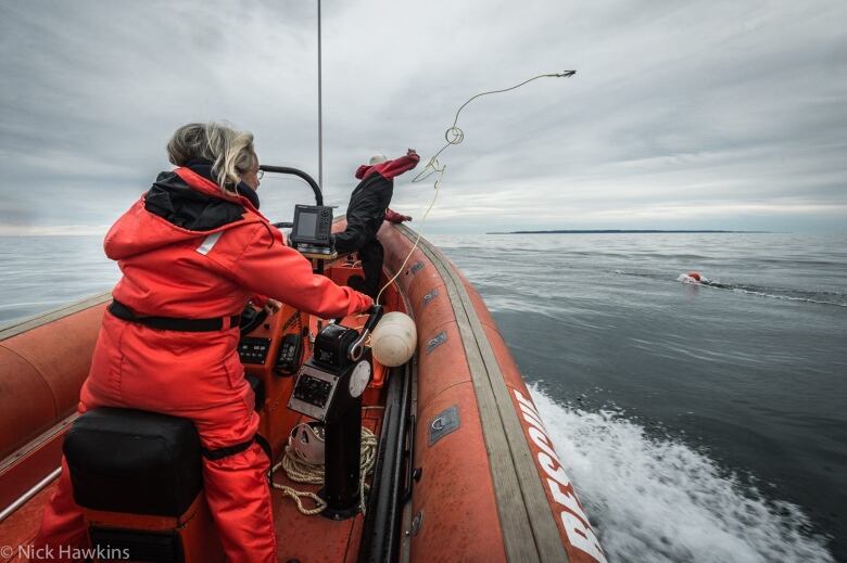 Woman on rescue boat