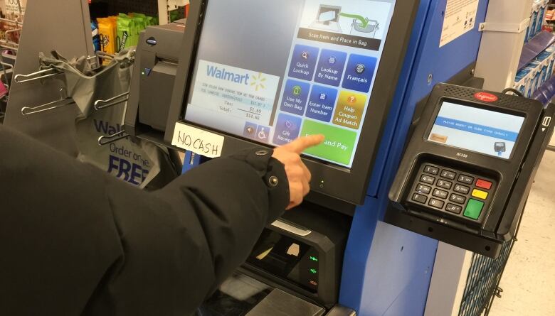 A self-checkout monitor at Walmart