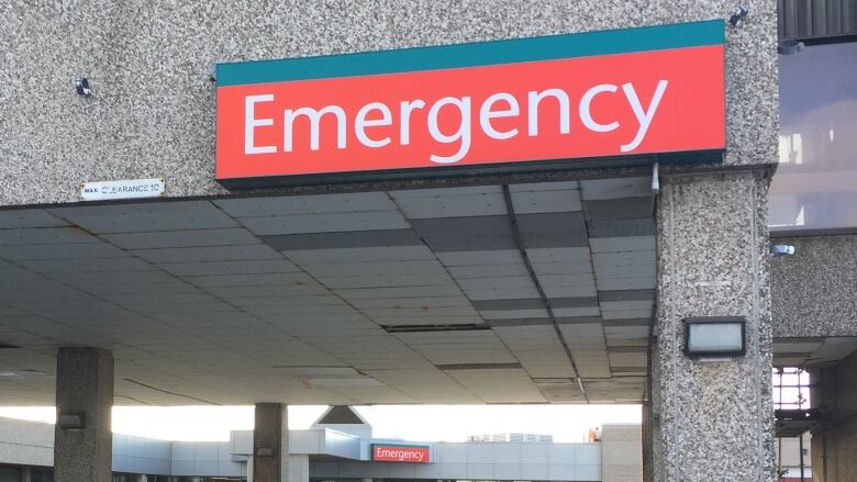 An emergency department sign is shown.