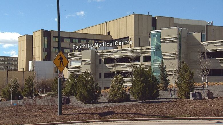 a grey building with a sign that reads 'foothills medical centre' 