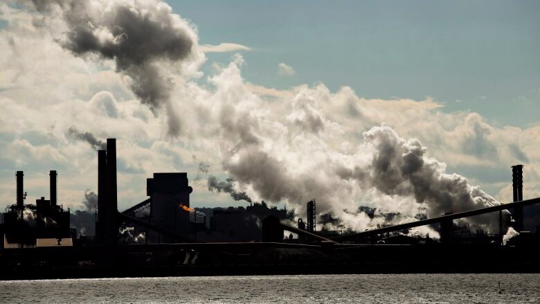 Power plant with lots of smoke arising from it