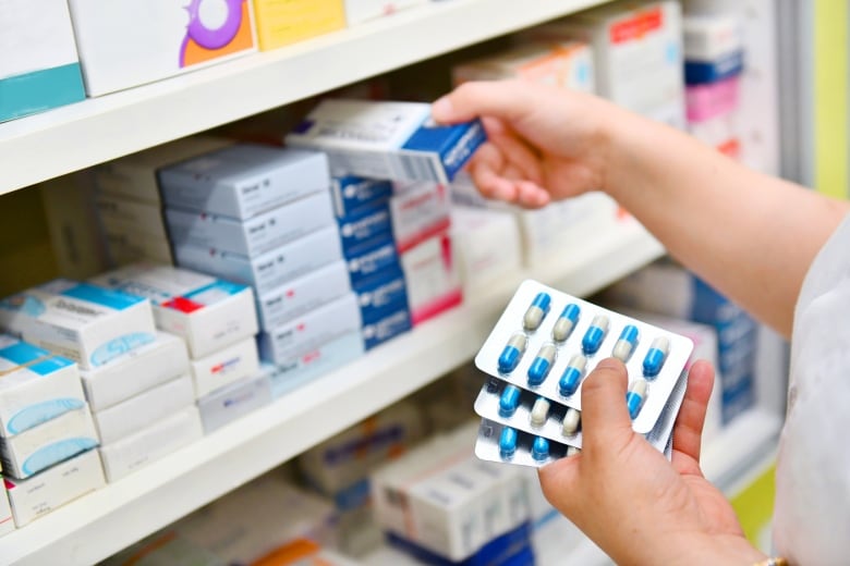 Drugs on a pharmacy shelf.