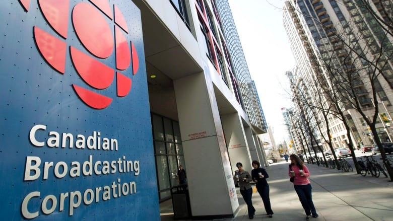 The exterior of a large building bearing the CBC logo. 