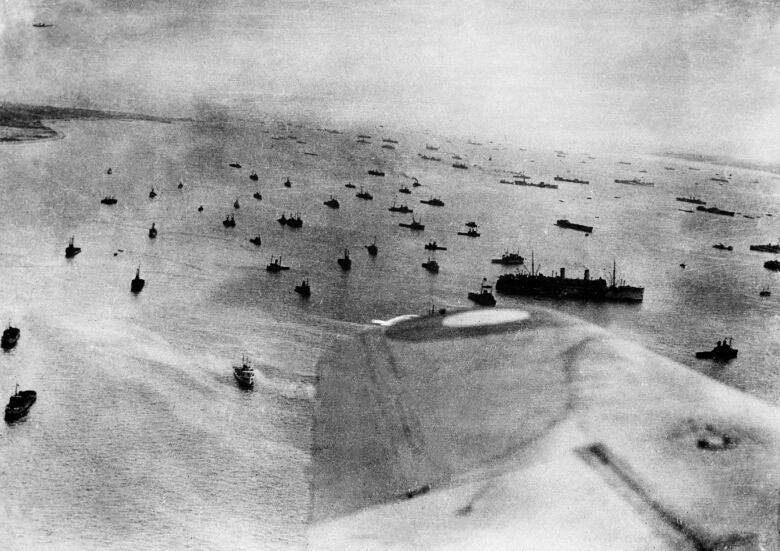 This photo shows an aerial view of countless Allied ships taking part in Operation Overlord who are preparing to storm the beaches of Normandy, France, on D-Day.