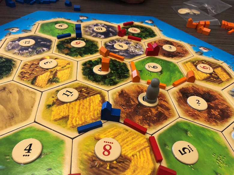 Board game tiles from the game Catan.