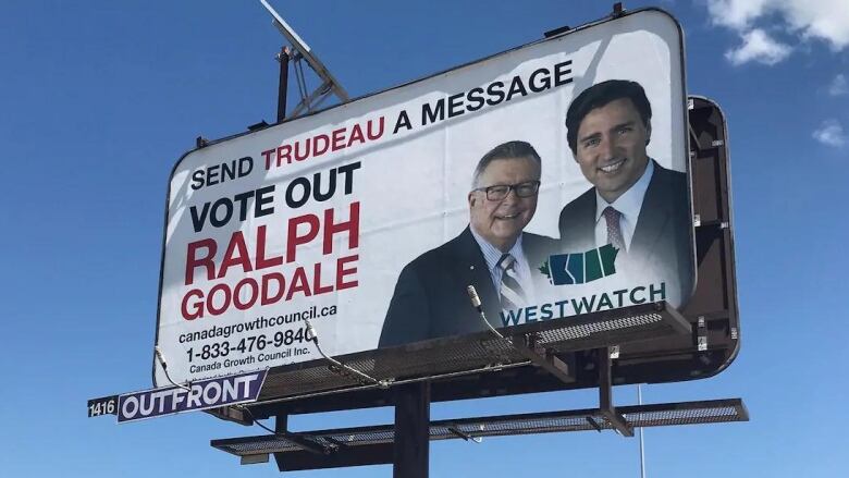 A billboard bearing images of long-time Saskatchewan Liberal MP Ralph Goodale and Prime Minister Justin Trudeau.