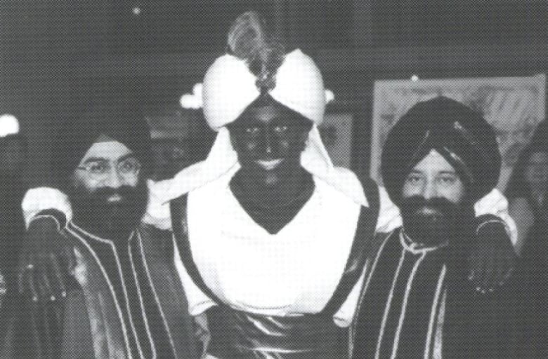 Justin Trudeau is seen wearing blackface in this April 2001image published in a newsletter from the West Point Grey Academy.