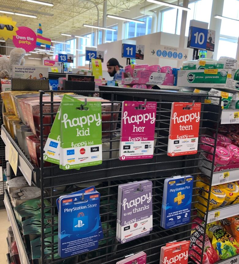 Gift cards on a rack.