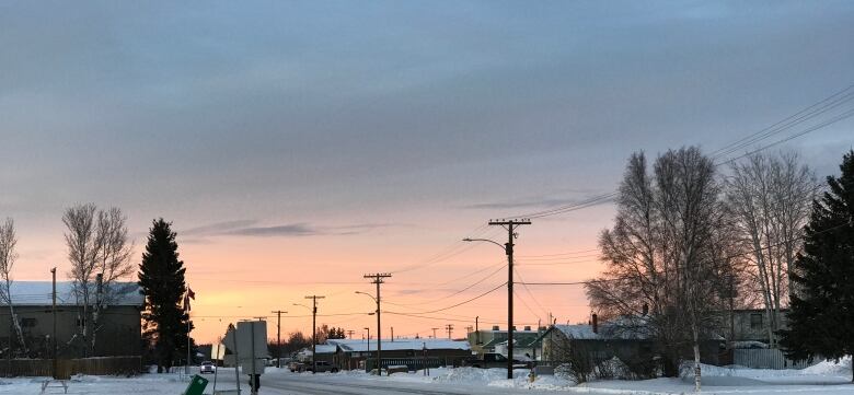 A street in Fort Simpson during a sunset. 