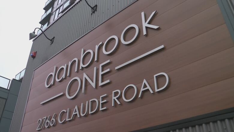 A sign of the building's old name, Danbrook One, is pictured outside the structure.