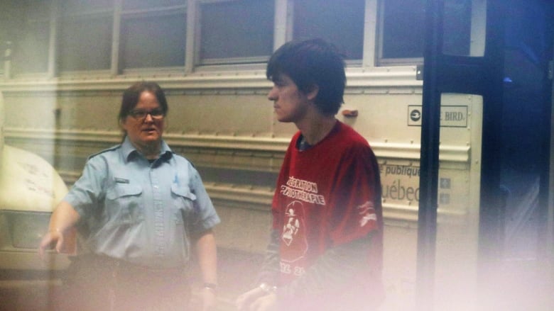 Alexandre Bissonnette, a suspect in a shooting at a Quebec City mosque, arrives at the court house in Quebec City on Tuesday, February 21, 2017. The accused in Quebec City's deadly mosque shooting formally changed lawyers on Thursday during a brief court hearing. Alexandre Bissonnette, 27, appeared briefly before Quebec court Judge Jean-Louis Lemay and acknowledged he was bringing in a new attorney.THE CANADIAN PRESS/Mathieu Belanger - POOL