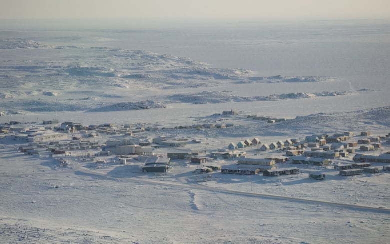 The hamlet of Taloyoak shot from above in winter. 