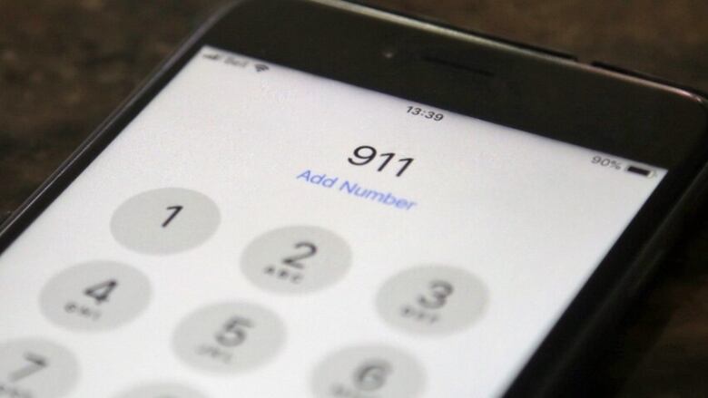 phone screen with 911 dialed