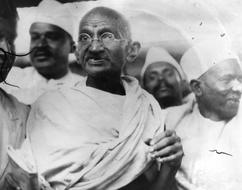 Mahatma Gandhi (Mohandas Karamchand Gandhi,1869 - 1948), Indian nationalist and spiritual leader, leading the Salt March in protest against the government monopoly on salt production.