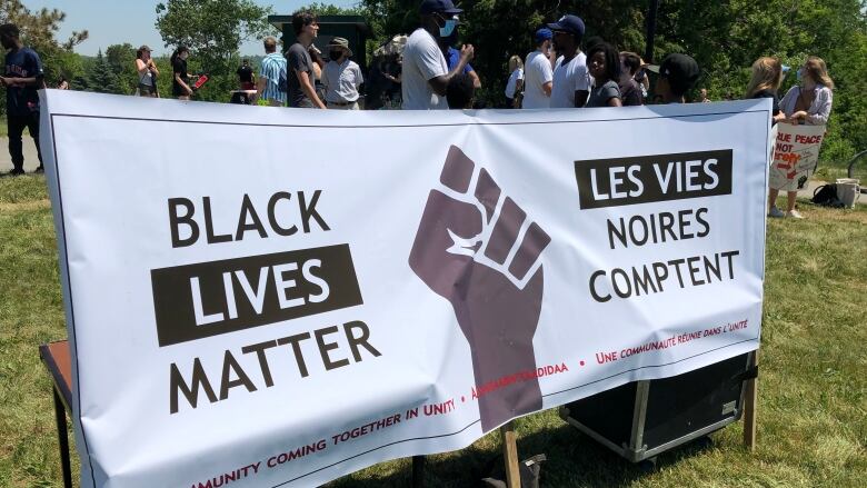 A BLM Sudbury banner on a sunny day.