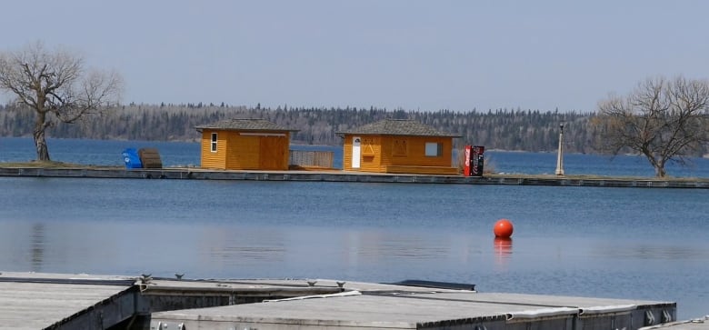 A view of a marina on a lake.